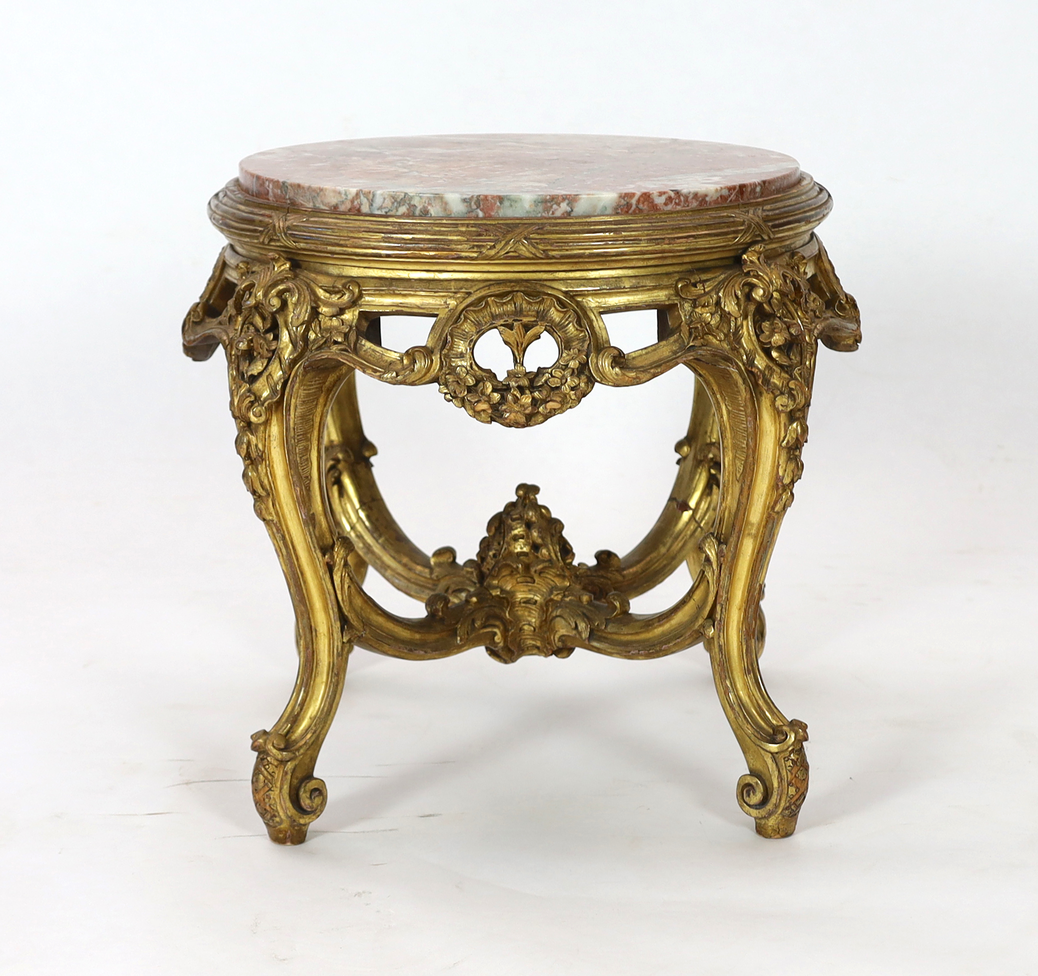 A Queen Mary giltwood and composition low stand, early 20th century, 56cm diameter, 53cm high, Please note this lot attracts an additional import tax of 5% on the hammer price